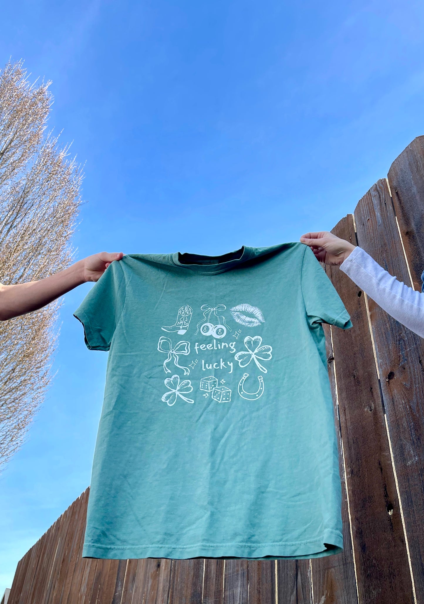 Green, Feeling Lucky women's graphic tee. Trendy, vintage t-shirt.