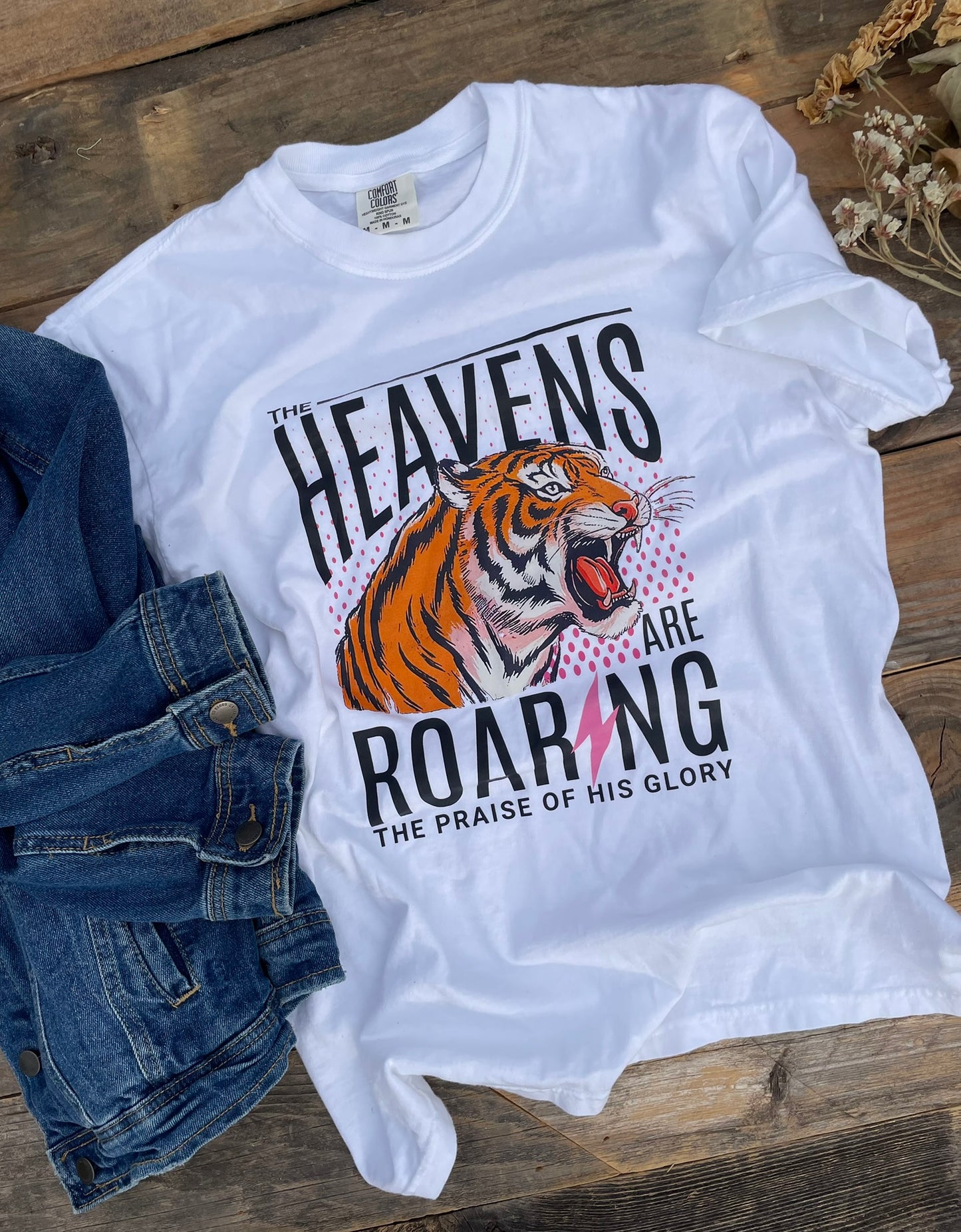 White t-shirt with Heavens are Roaring and a tiger printed on the front