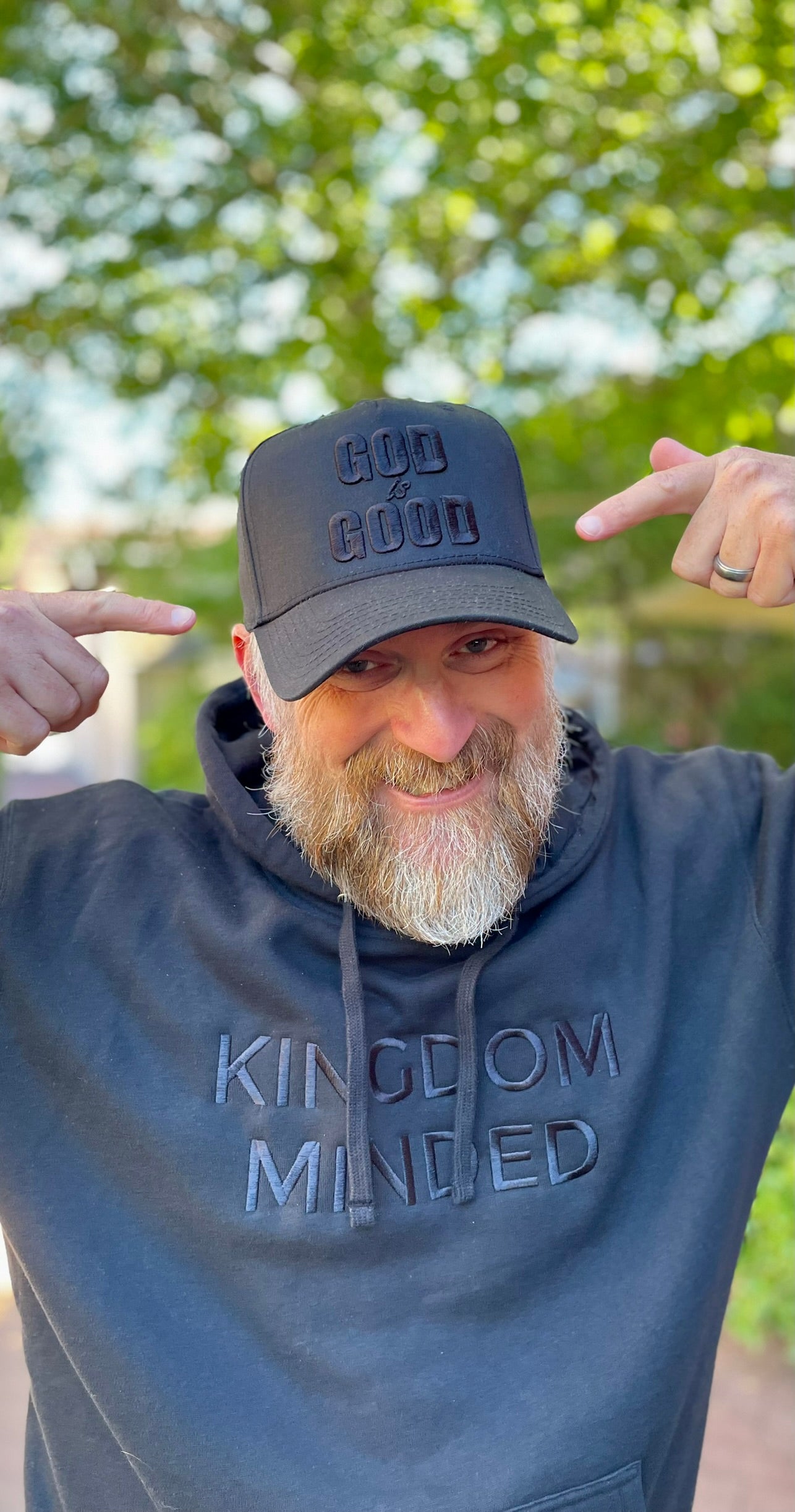 Black hoodie with black Kingdom Minded embroidered on it