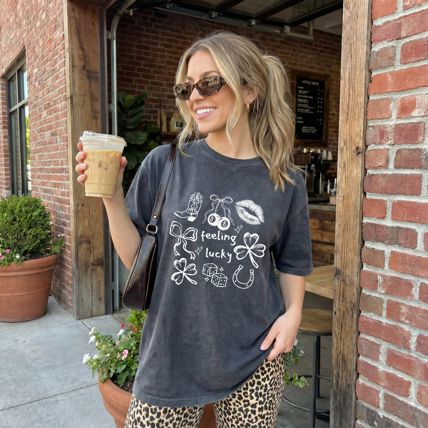 Vintage wash black, Feeling Lucky women's graphic tee.  Trendy, cozy t-shirt.