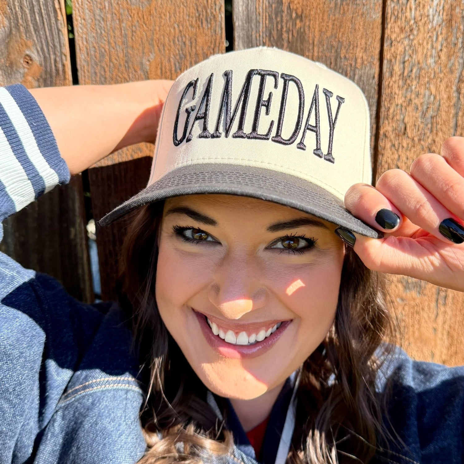 GAMEDAY embroidered in black on beige and black hat