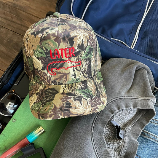 Camouflage hat with red later gator design