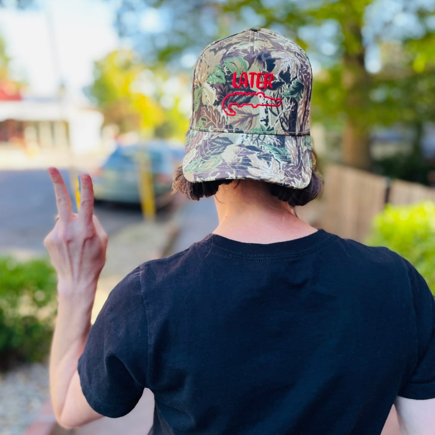 Camouflage hat with Later and image of gator embroidered in red