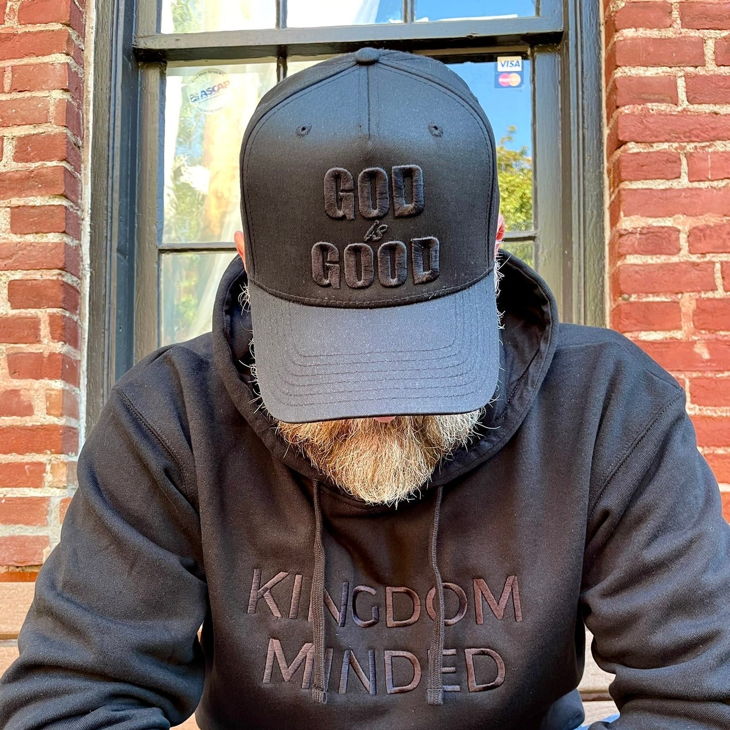 Black hat embroidered with God is Good in  black and black Kingdom Minded hoodie