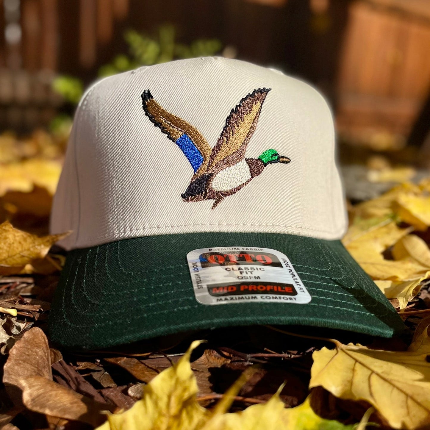 Trucker hat with embroidered mallard duck on it