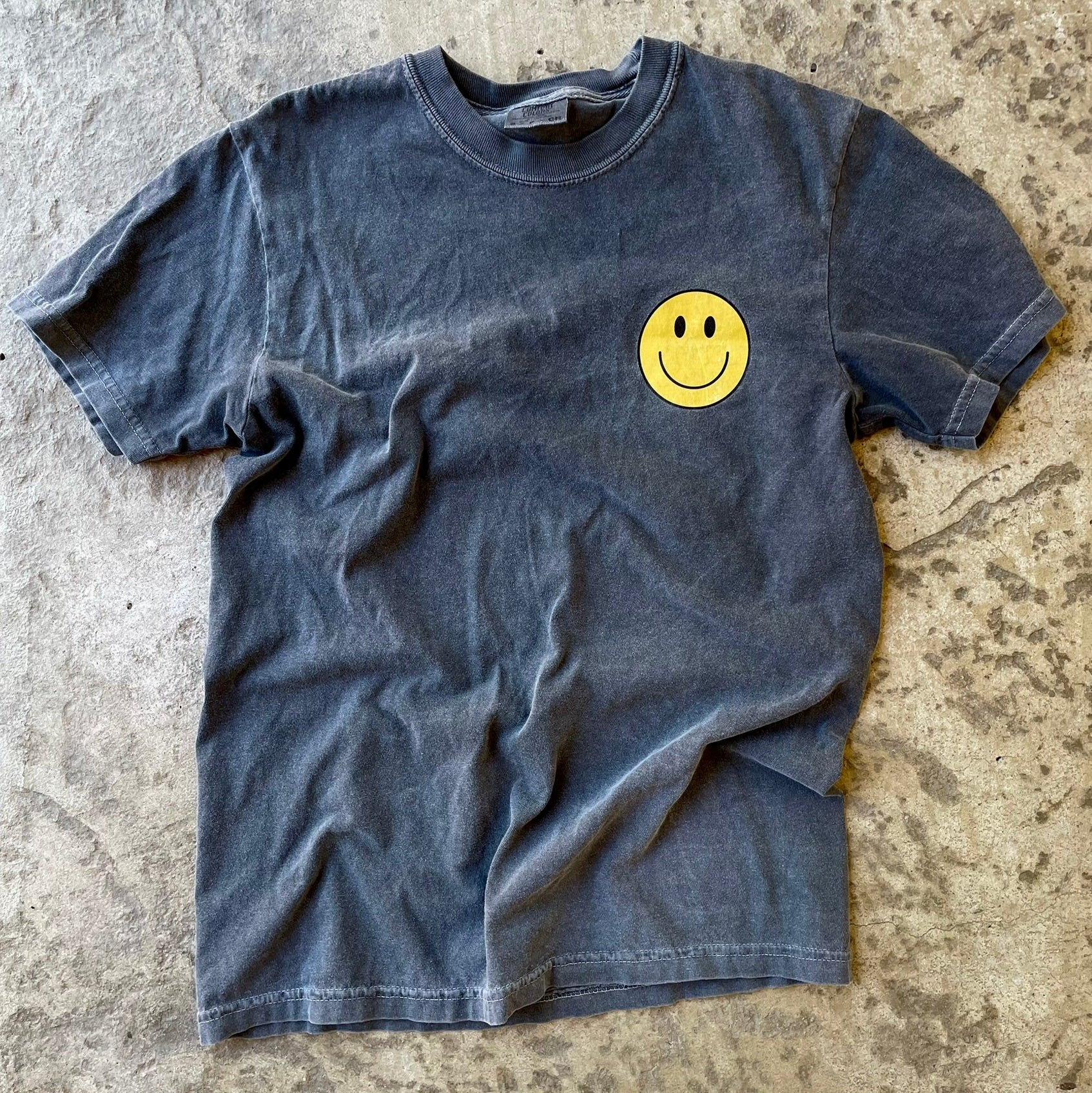 Smiley face on pepper comfort color t-shirt